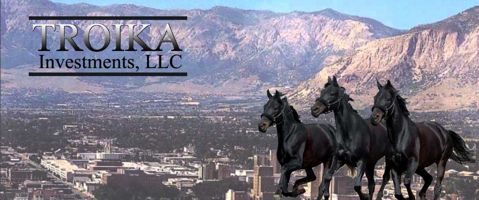 Troika Investments, LLC — three horses running before a mountain range